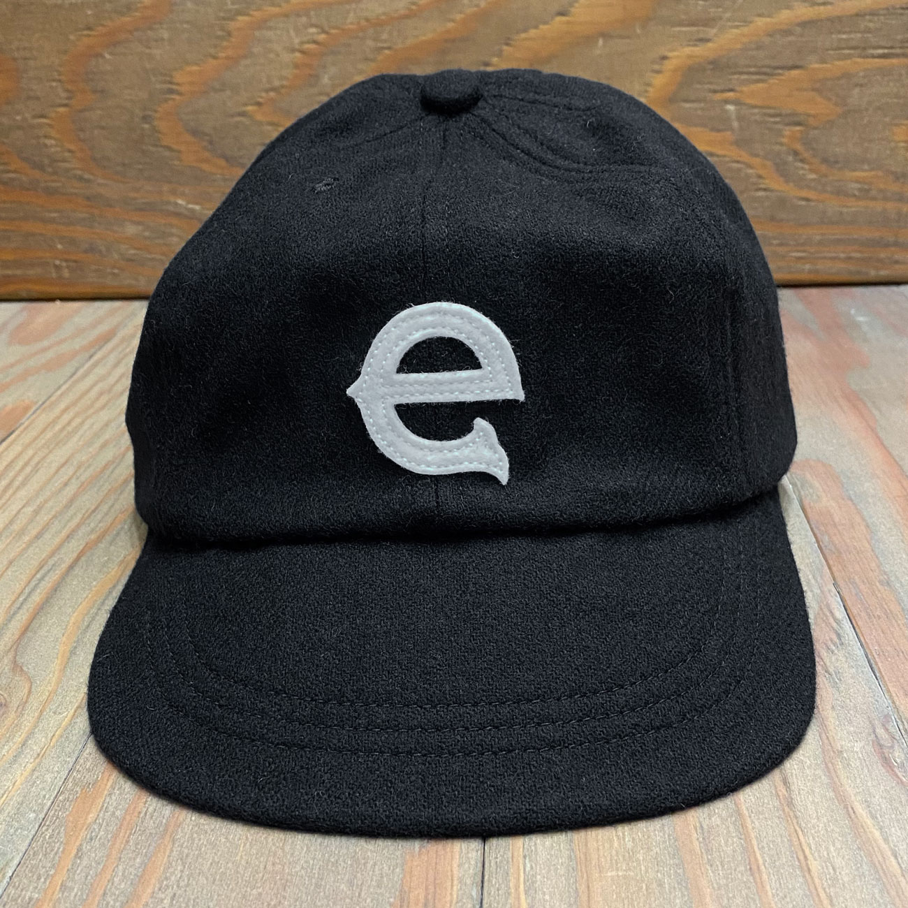 EVISEN E LOGO ONE CAP