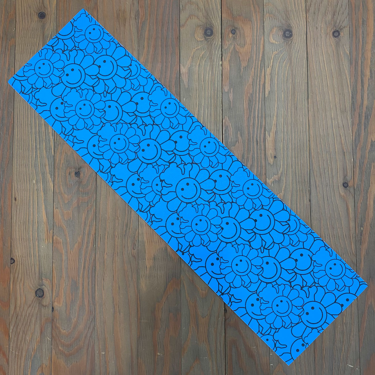 GRIZZLY SMILING FLOWER BEAR BLUE GRIPTAPE