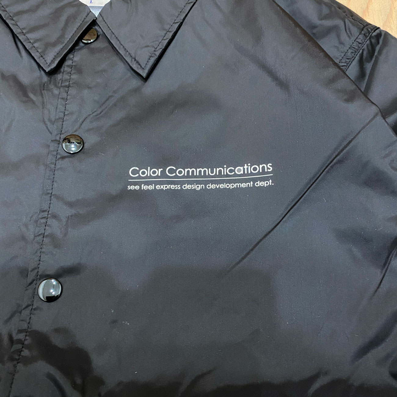 COLOR COMMUNICATIONS RE-LETTER 2012 COACH JACKET